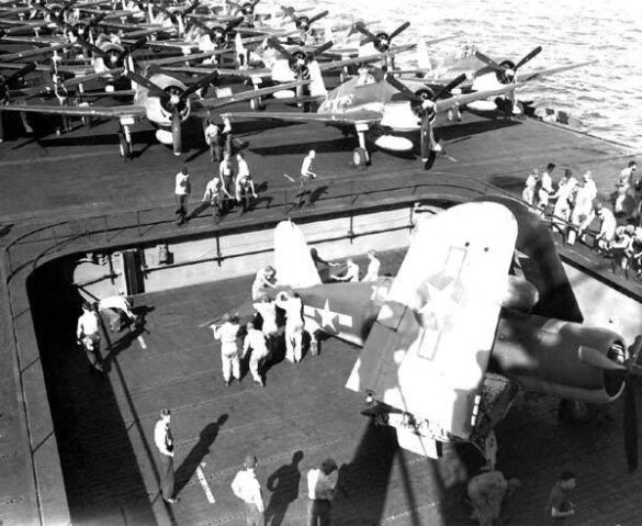 "F4U-2(N) Corsair night fighter with radar dome on right wingtip – VF(N)-101, USS Enterprise, 1944" "Modified F4U-1A Corsair converted to night fighter configuration – VMF(N)-532, Roi Island base, 1944" "US Navy F4U-2 Corsair with flame arrestors and black-over-blue night camouflage" "Close-up of AIA radar dome installed on F4U-2 wing – early WWII night fighter technology" "Cockpit interior of F4U-2(N) with Sperry autopilot and radar display"