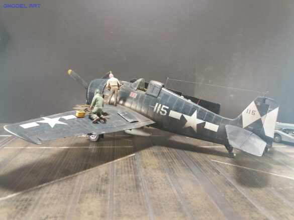 Eduard 1/48 F6F-5 Hellcat “White 115” parked on US Navy carrier deck diorama – folded wings and weathered WWII carrier fighter scene