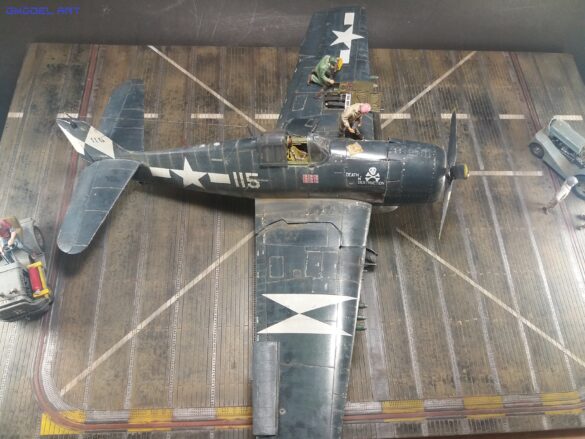 Eduard 1/48 F6F-5 Hellcat “White 115” parked on US Navy carrier deck diorama – folded wings and weathered WWII carrier fighter scene