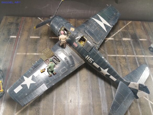 Eduard 1/48 F6F-5 Hellcat “White 115” parked on US Navy carrier deck diorama – folded wings and weathered WWII carrier fighter scene