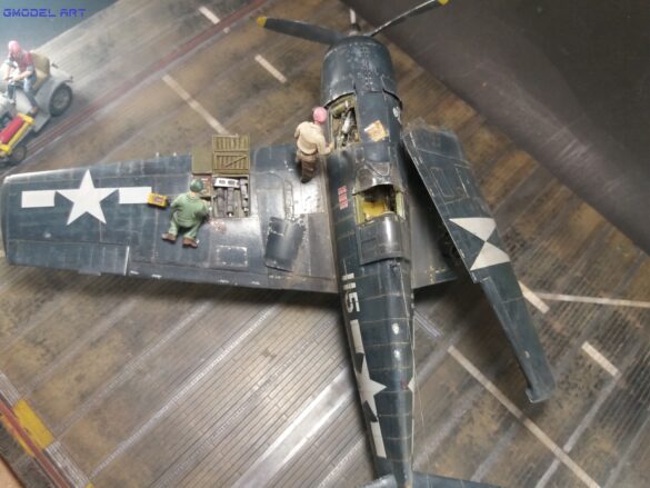 Eduard 1/48 F6F-5 Hellcat “White 115” parked on US Navy carrier deck diorama – folded wings and weathered WWII carrier fighter scene