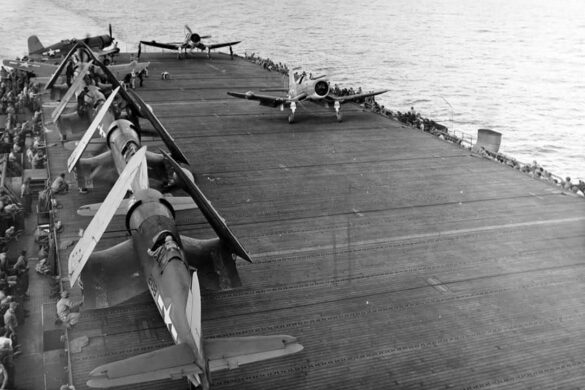 "F4U-2(N) Corsair night fighter with radar dome on right wingtip – VF(N)-101, USS Enterprise, 1944" "Modified F4U-1A Corsair converted to night fighter configuration – VMF(N)-532, Roi Island base, 1944" "US Navy F4U-2 Corsair with flame arrestors and black-over-blue night camouflage" "Close-up of AIA radar dome installed on F4U-2 wing – early WWII night fighter technology" "Cockpit interior of F4U-2(N) with Sperry autopilot and radar display"