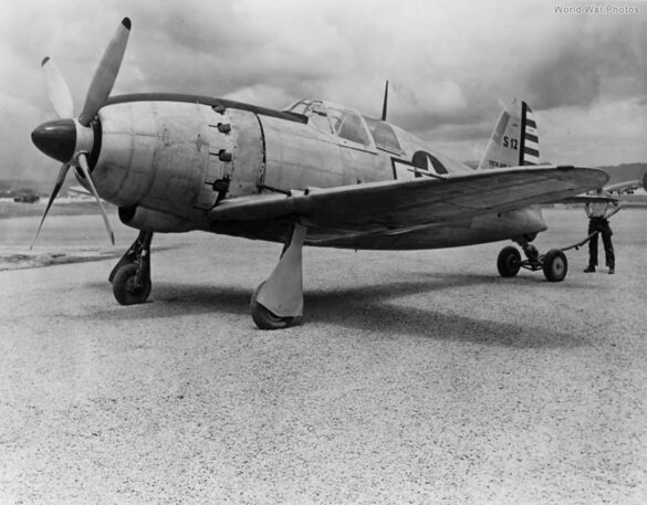 Scale model of the Mitsubishi J2M3 Raiden in 1/48, painted in American markings with heavy weathering.