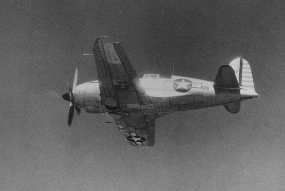 Scale model of the Mitsubishi J2M3 Raiden in 1/48, painted in American markings with heavy weathering.