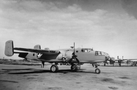 "USMC PBJ-1H Mitchell with radar pod and rocket launchers on a Pacific island, 1945"