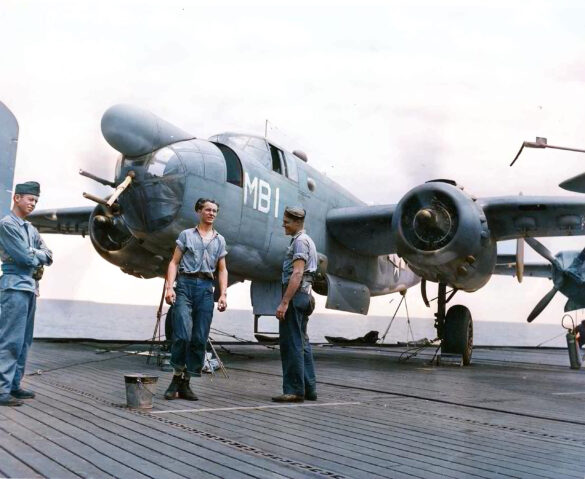 "USMC PBJ-1H Mitchell with radar pod and rocket launchers on a Pacific island, 1945"