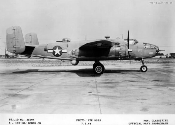 "USMC PBJ-1H Mitchell with radar pod and rocket launchers on a Pacific island, 1945"