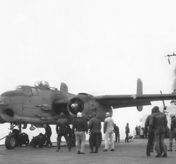 "USMC PBJ-1H Mitchell with radar pod and rocket launchers on a Pacific island, 1945"