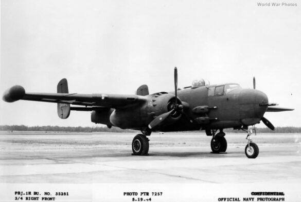 "USMC PBJ-1H Mitchell with radar pod and rocket launchers on a Pacific island, 1945"
