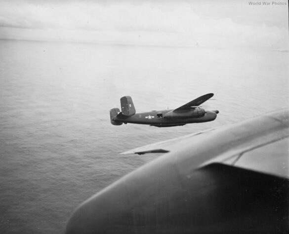 "USMC PBJ-1H Mitchell with radar pod and rocket launchers on a Pacific island, 1945"