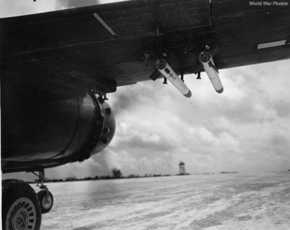 "USMC PBJ-1H Mitchell with radar pod and rocket launchers on a Pacific island, 1945"