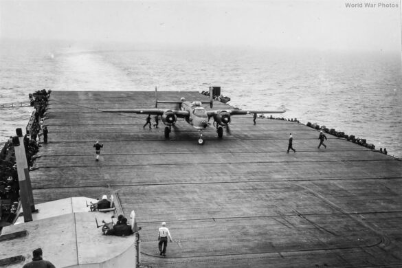 "USMC PBJ-1H Mitchell with radar pod and rocket launchers on a Pacific island, 1945"