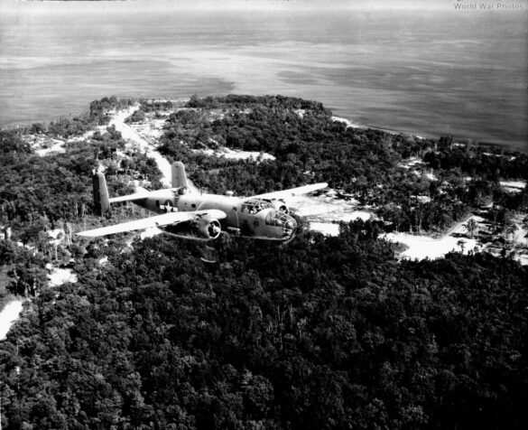"USMC PBJ-1H Mitchell with radar pod and rocket launchers on a Pacific island, 1945"