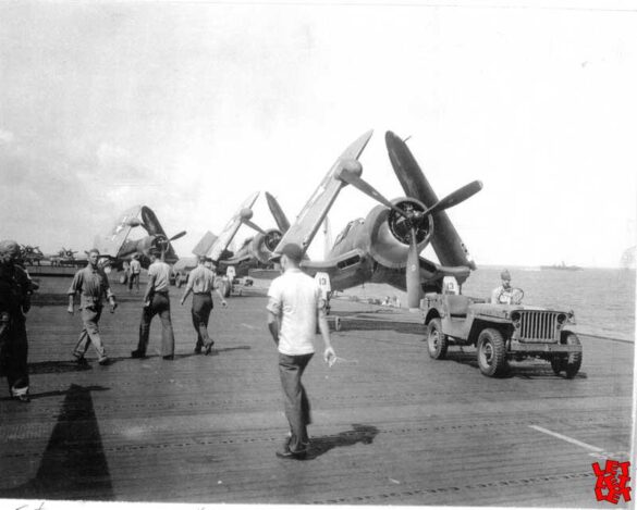 "F4U-2(N) Corsair night fighter with radar dome on right wingtip – VF(N)-101, USS Enterprise, 1944" "Modified F4U-1A Corsair converted to night fighter configuration – VMF(N)-532, Roi Island base, 1944" "US Navy F4U-2 Corsair with flame arrestors and black-over-blue night camouflage" "Close-up of AIA radar dome installed on F4U-2 wing – early WWII night fighter technology" "Cockpit interior of F4U-2(N) with Sperry autopilot and radar display"