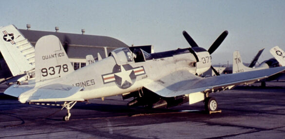 “Vought AU-1 Corsair in Light Gull Gray over Insignia White parked at NAS North Island, January 1956 – side profile with underwing pylons visible.”