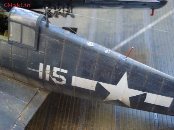Eduard 1/48 F6F-5 Hellcat “White 115” parked on US Navy carrier deck diorama – folded wings and weathered WWII carrier fighter scene