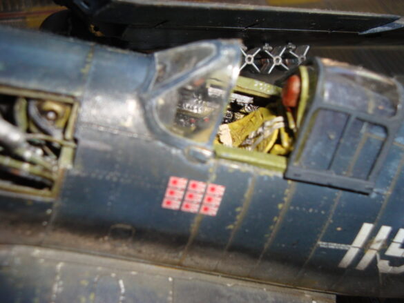 Eduard 1/48 F6F-5 Hellcat “White 115” parked on US Navy carrier deck diorama – folded wings and weathered WWII carrier fighter scene