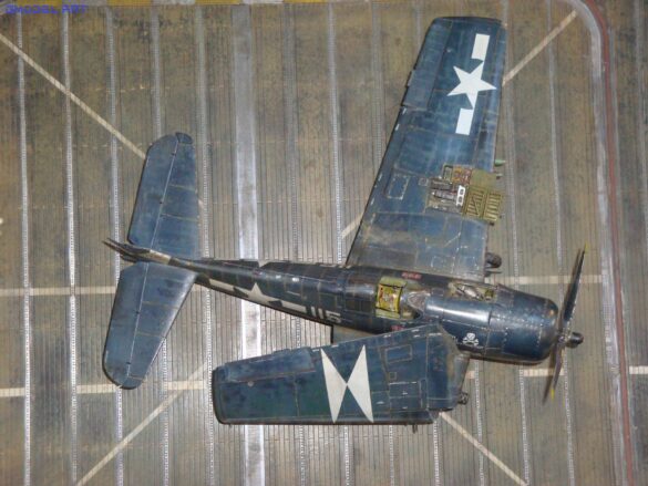 Eduard 1/48 F6F-5 Hellcat “White 115” parked on US Navy carrier deck diorama – folded wings and weathered WWII carrier fighter scene