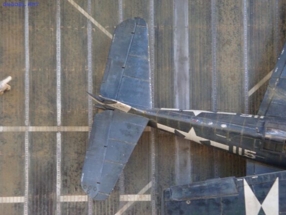 Eduard 1/48 F6F-5 Hellcat “White 115” parked on US Navy carrier deck diorama – folded wings and weathered WWII carrier fighter scene
