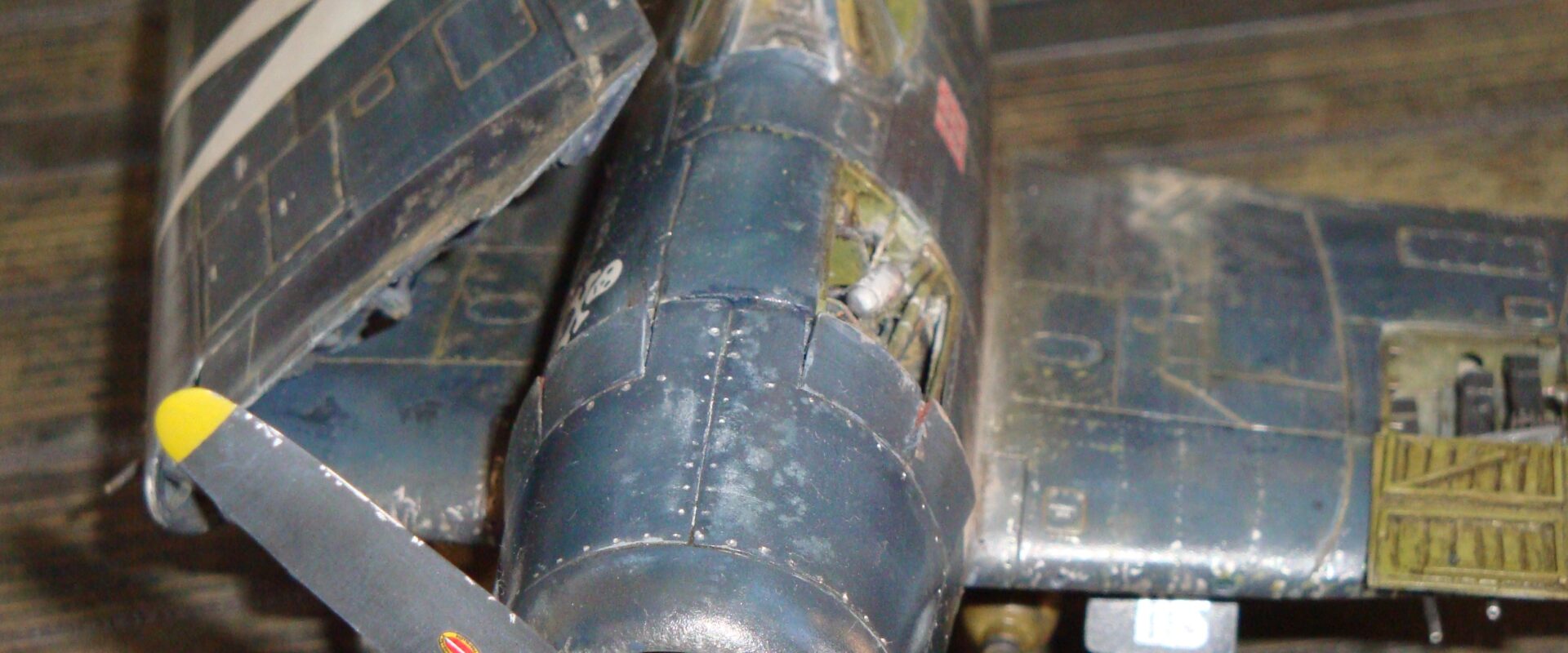 Eduard 1/48 F6F-5 Hellcat “White 115” parked on US Navy carrier deck diorama – folded wings and weathered WWII carrier fighter scene