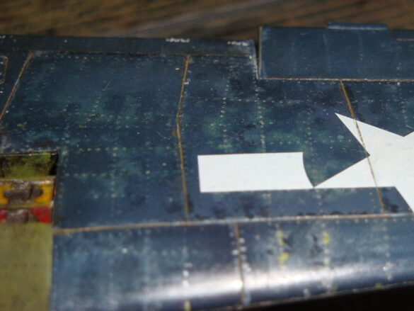 Eduard 1/48 F6F-5 Hellcat “White 115” parked on US Navy carrier deck diorama – folded wings and weathered WWII carrier fighter scene