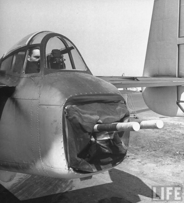 "USMC PBJ-1H Mitchell with radar pod and rocket launchers on a Pacific island, 1945"