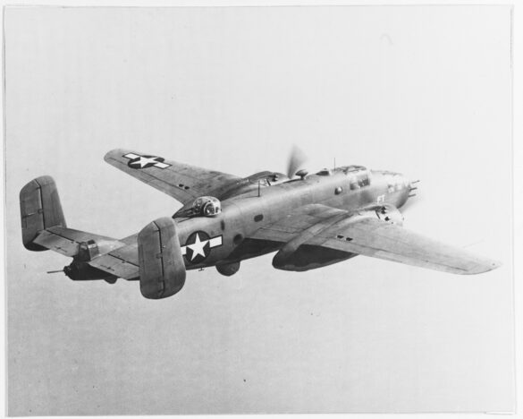 "USMC PBJ-1H Mitchell with radar pod and rocket launchers on a Pacific island, 1945"