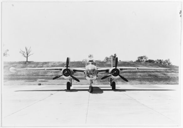 "USMC PBJ-1H Mitchell with radar pod and rocket launchers on a Pacific island, 1945"