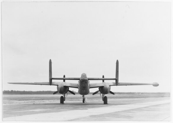"USMC PBJ-1H Mitchell with radar pod and rocket launchers on a Pacific island, 1945"