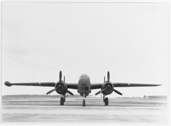 "USMC PBJ-1H Mitchell with radar pod and rocket launchers on a Pacific island, 1945"