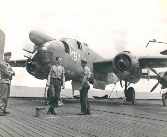 "USMC PBJ-1H Mitchell with radar pod and rocket launchers on a Pacific island, 1945"