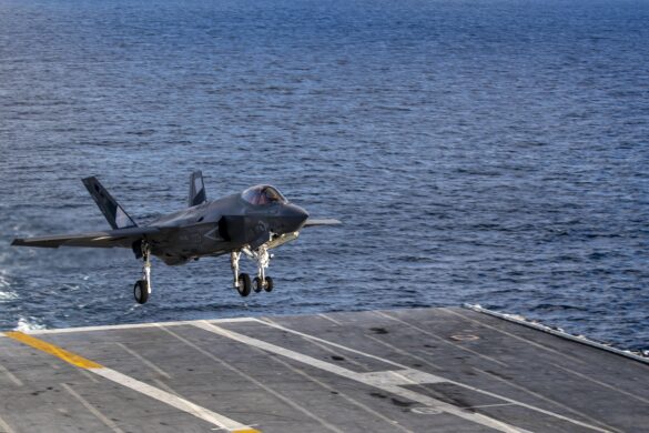 F-35C VX-9 Vampires with reflective mirror stealth coating and visible tail insignia