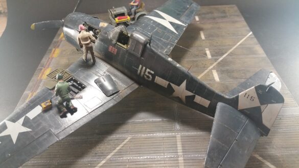 Eduard 1/48 F6F-5 Hellcat “White 115” parked on US Navy carrier deck diorama – folded wings and weathered WWII carrier fighter scene