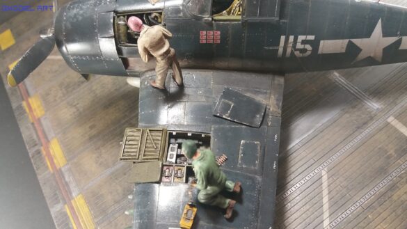 Eduard 1/48 F6F-5 Hellcat “White 115” parked on US Navy carrier deck diorama – folded wings and weathered WWII carrier fighter scene