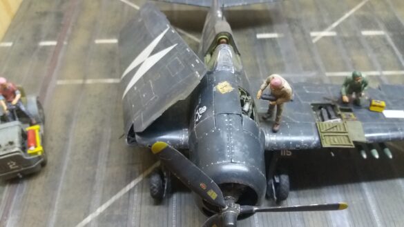 Eduard 1/48 F6F-5 Hellcat “White 115” parked on US Navy carrier deck diorama – folded wings and weathered WWII carrier fighter scene