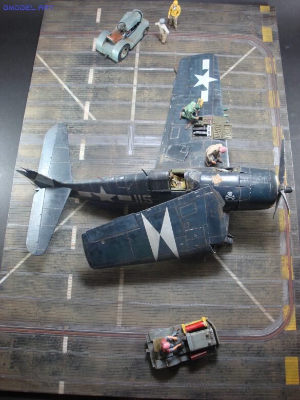 Eduard 1/48 F6F-5 Hellcat “White 115” parked on US Navy carrier deck diorama – folded wings and weathered WWII carrier fighter scene