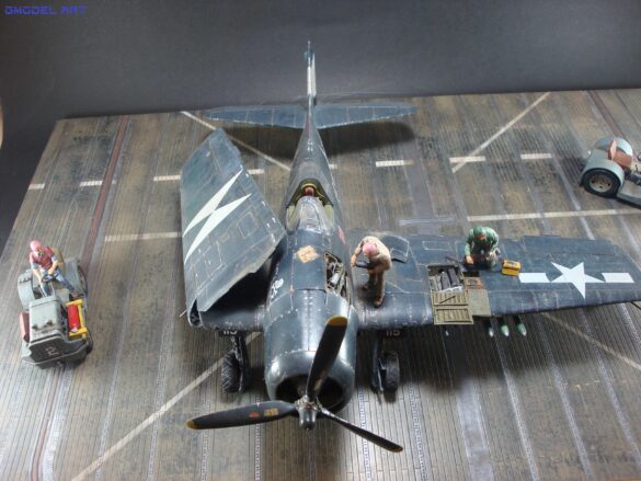 Eduard 1/48 F6F-5 Hellcat “White 115” parked on US Navy carrier deck diorama – folded wings and weathered WWII carrier fighter scene