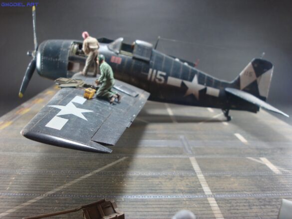Eduard 1/48 F6F-5 Hellcat “White 115” parked on US Navy carrier deck diorama – folded wings and weathered WWII carrier fighter scene