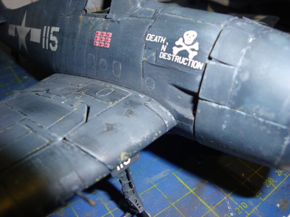 Eduard 1/48 F6F-5 Hellcat “White 115” parked on US Navy carrier deck diorama – folded wings and weathered WWII carrier fighter scene