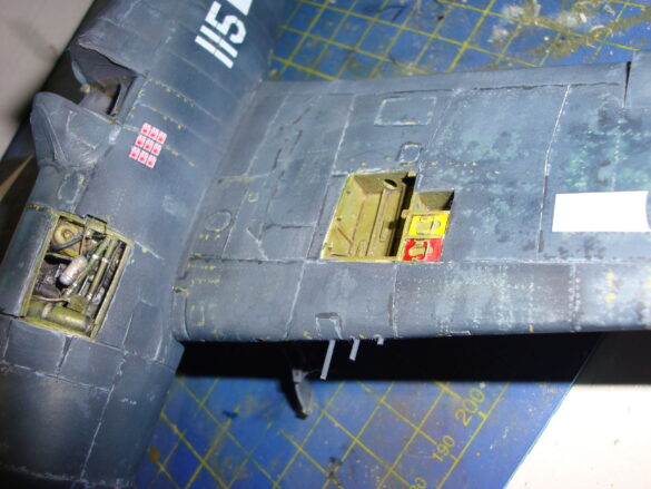 Eduard 1/48 F6F-5 Hellcat “White 115” parked on US Navy carrier deck diorama – folded wings and weathered WWII carrier fighter scene