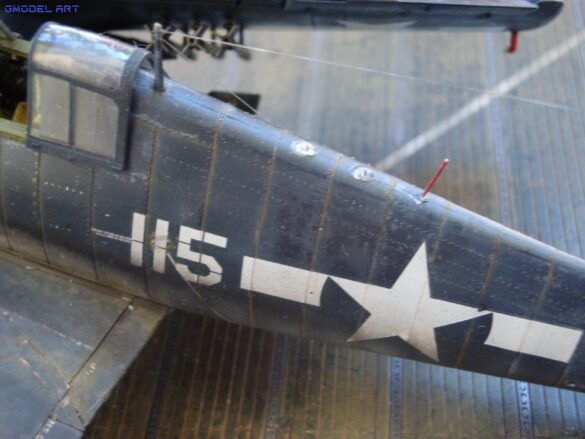 Eduard 1/48 F6F-5 Hellcat “White 115” parked on US Navy carrier deck diorama – folded wings and weathered WWII carrier fighter scene
