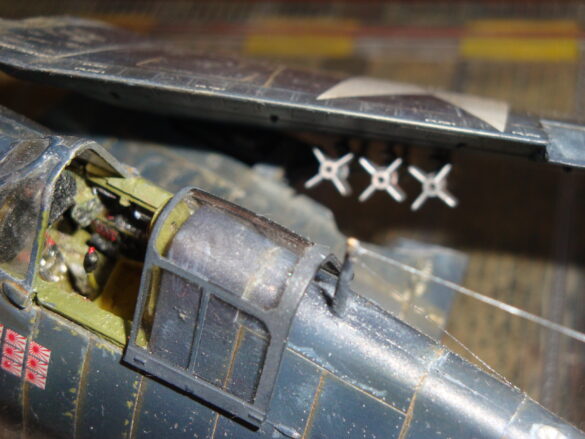 Eduard 1/48 F6F-5 Hellcat “White 115” parked on US Navy carrier deck diorama – folded wings and weathered WWII carrier fighter scene