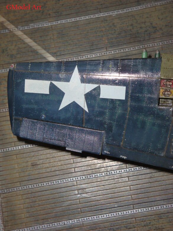 Eduard 1/48 F6F-5 Hellcat “White 115” parked on US Navy carrier deck diorama – folded wings and weathered WWII carrier fighter scene
