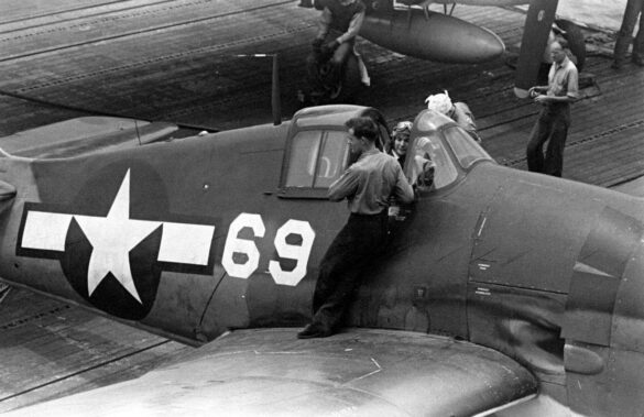 F6F Hellcat – Air Group 16 USS Lexington (CV-16) F6F-3 Hellcat Air Group 16 in tricolor variant aboard USS Lexington CV-16 with pilots before the mission