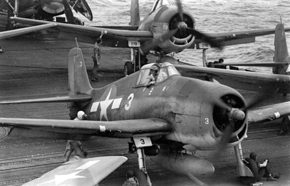 F6F Hellcat – Air Group 16 USS Lexington (CV-16) F6F-3 Hellcat Air Group 16 in tricolor variant aboard USS Lexington CV-16 with pilots before the mission