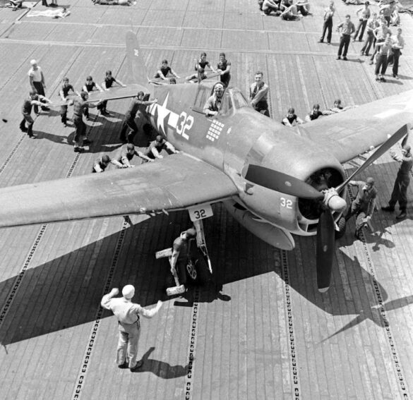F6F Hellcat – Air Group 16 USS Lexington (CV-16) F6F-3 Hellcat Air Group 16 in tricolor variant aboard USS Lexington CV-16 with pilots before the mission