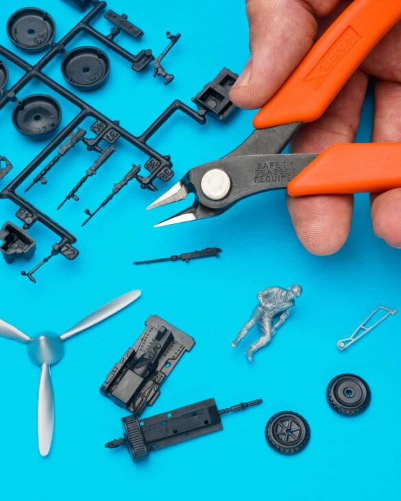 Modeling as Psychotherapy Scale Model Workspace Modeling as Psychotherapy scale model building workspace with tools and aircraft kit