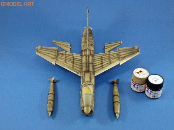 Model airplane with paint jars