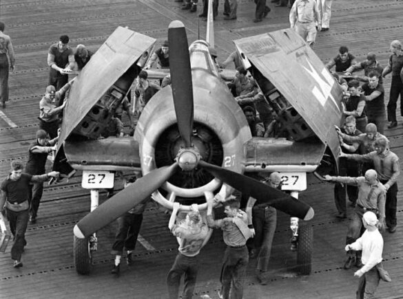 F6F Hellcat – Air Group 16 USS Lexington (CV-16) F6F-3 Hellcat Air Group 16 in tricolor variant aboard USS Lexington CV-16 with pilots before the mission