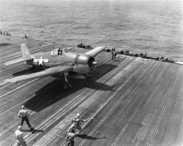 F6F Hellcat – Air Group 16 USS Lexington (CV-16) F6F-3 Hellcat Air Group 16 in tricolor variant aboard USS Lexington CV-16 with pilots before the mission
